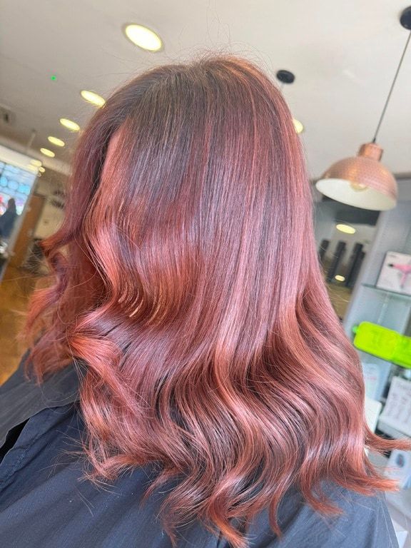 Rose copper colour on long waves, coloured at Thatchairs Hair & Body