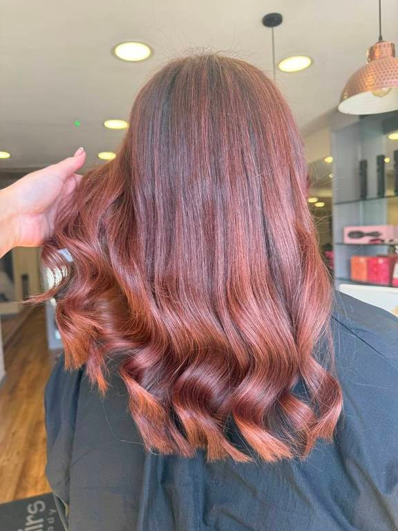 Rich copper red colour on long waves, coloured at Thatchairs Hair & Body