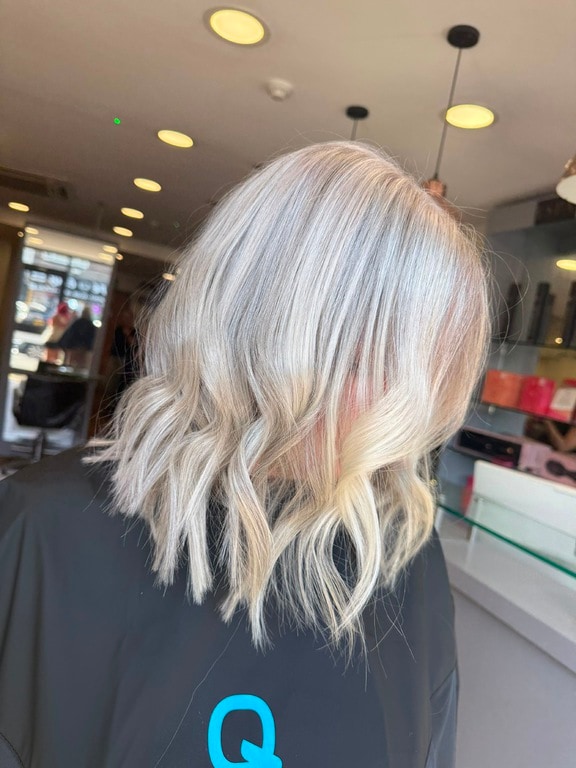 Icy blonde colour on a wavy lob, coloured at Thatchairs Hair & Body